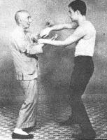 Yip Man and Bruce Lee Practicing Ving Tsun